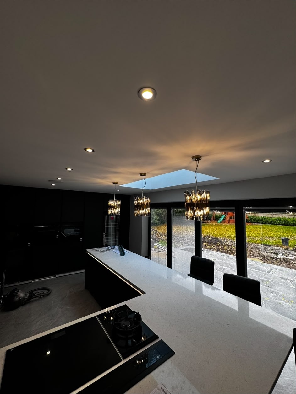 New kitchen electrical installation with island pendant lighting and recessed downlights in a Hampshire home