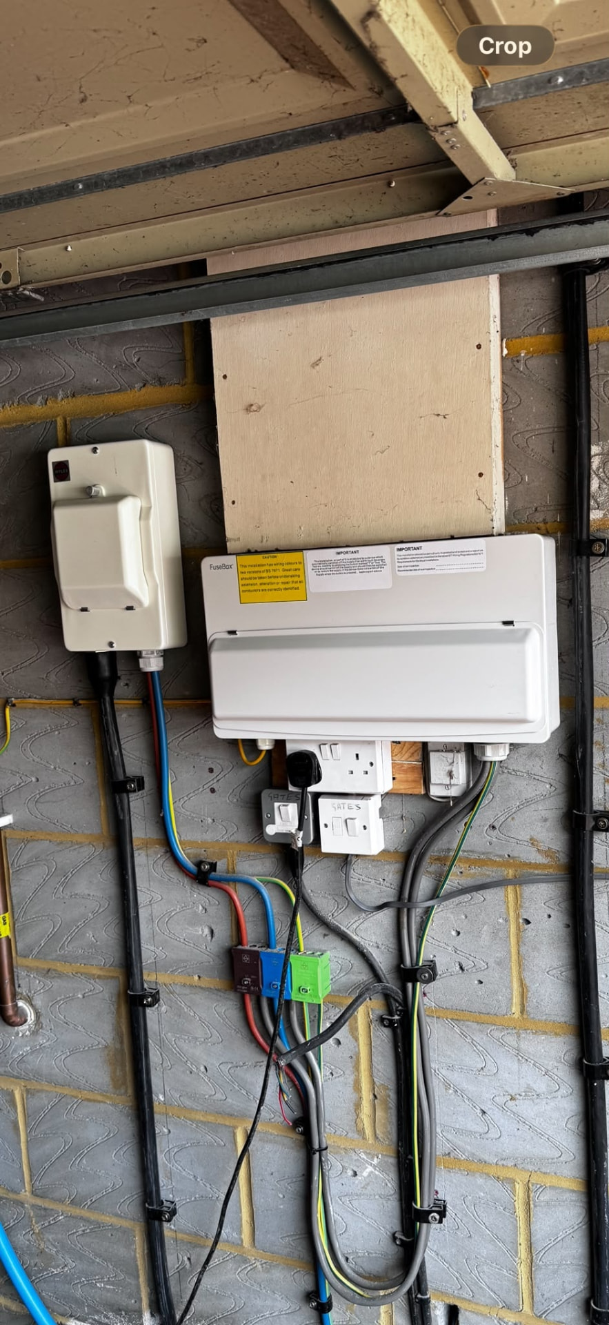 Replacement FuseBox consumer unit with RCBO protection installed on a garage wall in Fleet, Hampshire